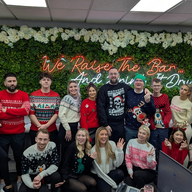 Stoke recruiters group photo in christmas jumpers