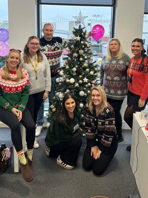 Warrington recruiters group photo in christmas jumpers.